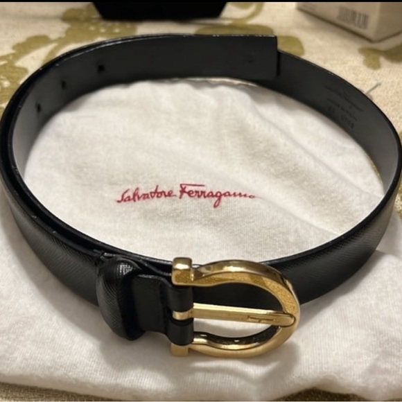 Salvatore Ferragamo black Gancini buckle gold leather belt...